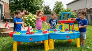 Kids enjoying cool outdoor play with a water table in summer.