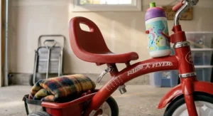 Radio Flyer tricycle with adjustable seat for growing children.