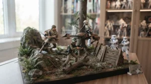 A dynamic diorama featuring Star Wars figures posed in an epic battle scene.