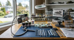 Essential precision hobby tools and airbrush kit used for painting advanced model kits.